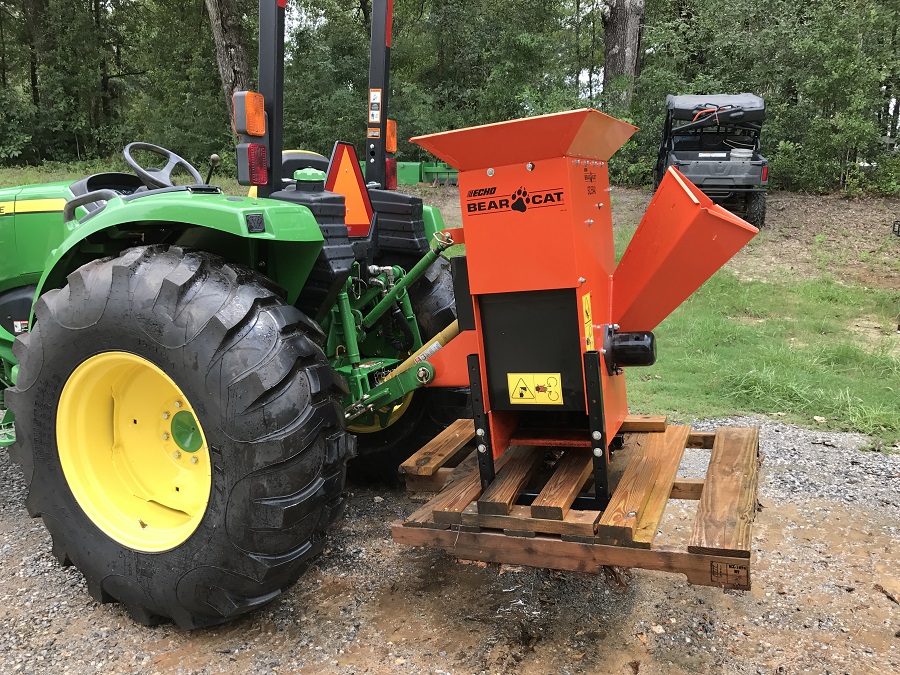 John Deere 4044M Tractor with Echo Bear Cat Raised