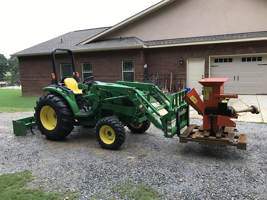 John Deere 4044M Tractor with Frontier Box Blade Right Side