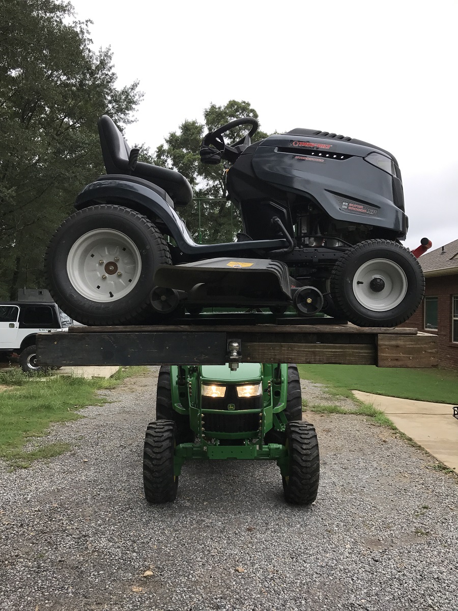 John Deere 4044M carrying Troy-Bilt Super Bronco